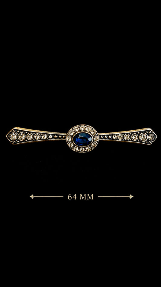 Luminosa parure fine anni ‘40, spilla a barretta e orecchini clip con cristalli e cabochons blu profondo