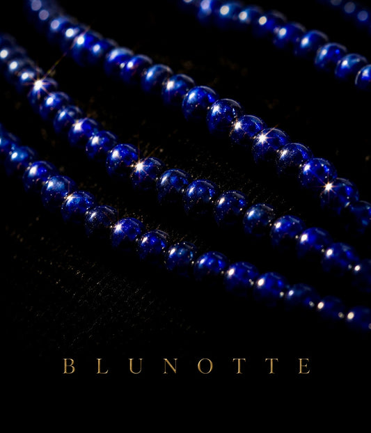 Parure BLU NOTTE americana anni ‘50 collana con fiocco in bagno oro e orecchini coordinati
