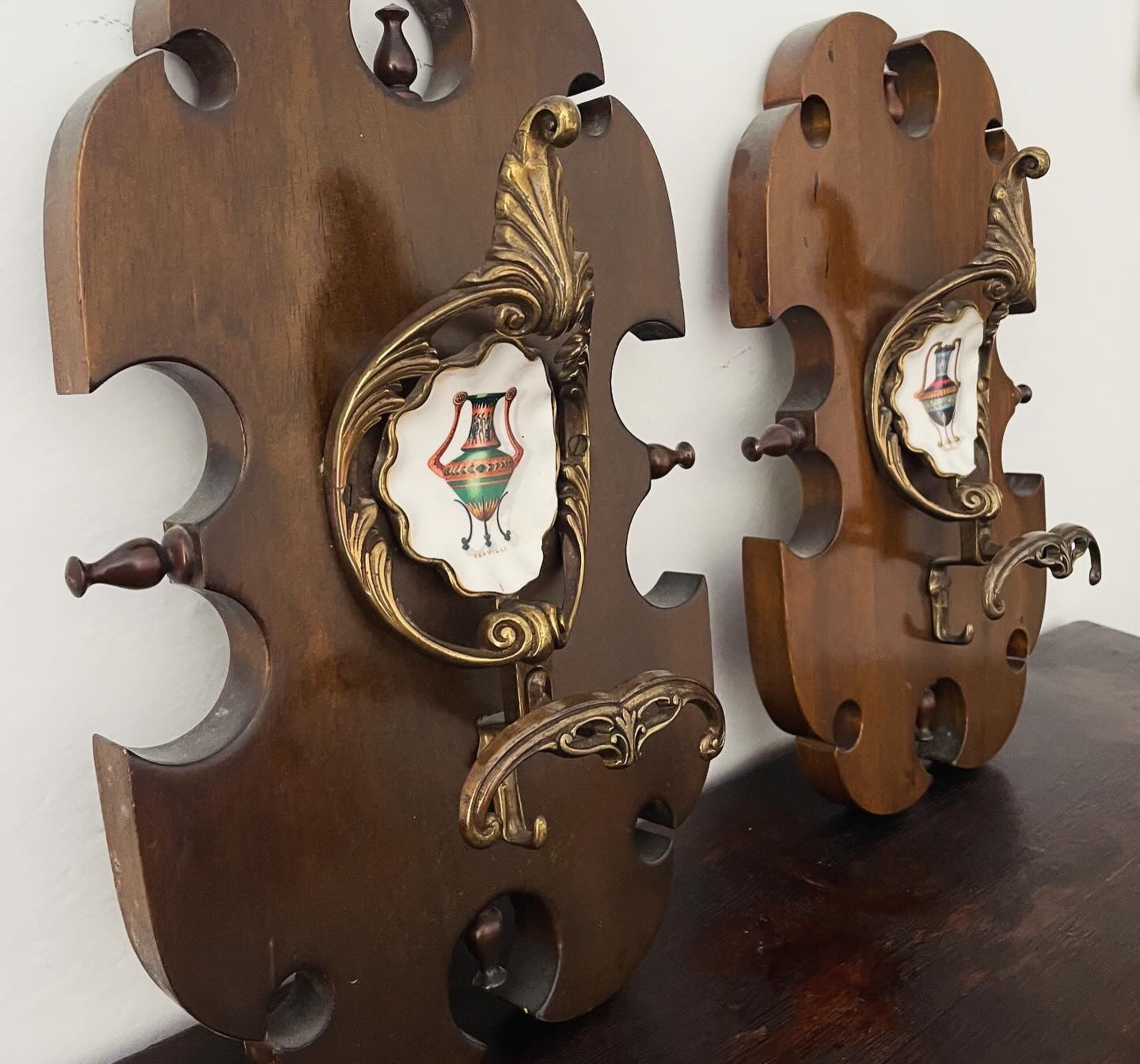 Pair of Cervilli ceramic coat hangers