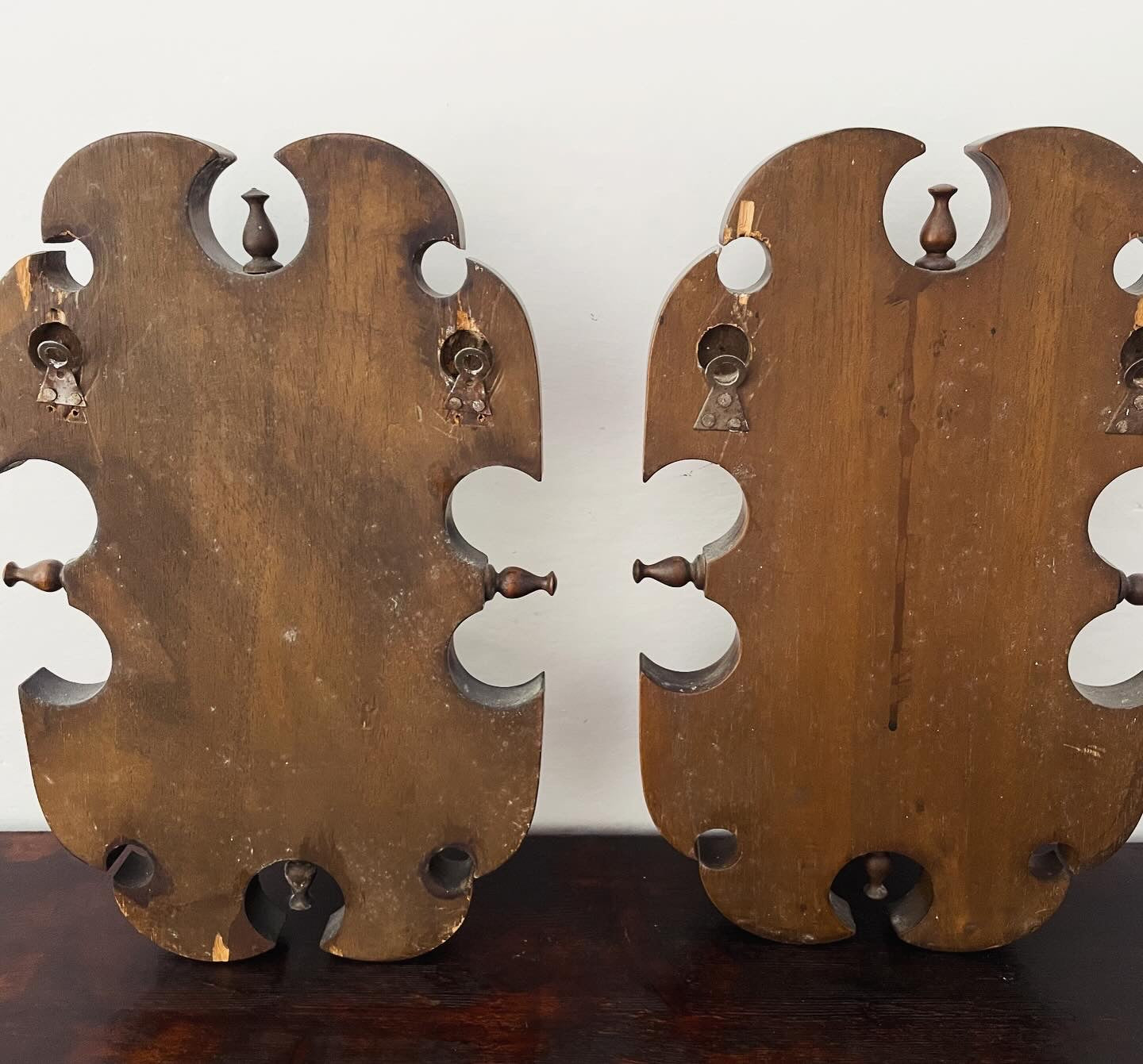 Pair of Cervilli ceramic coat hangers