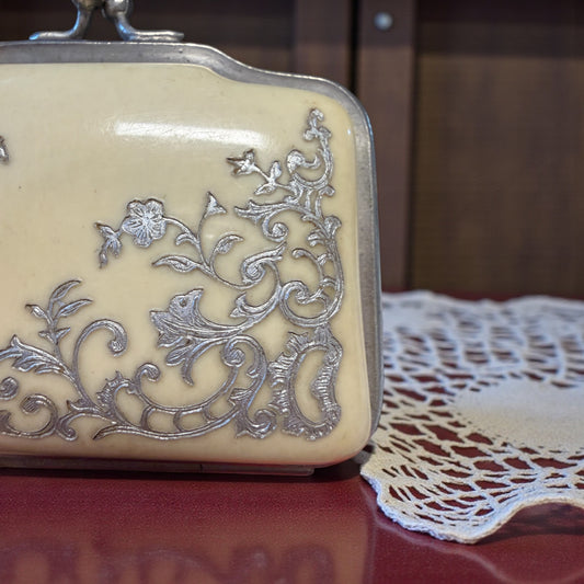 Portamonete da borsetta Liberty in bachelite con decori argentati