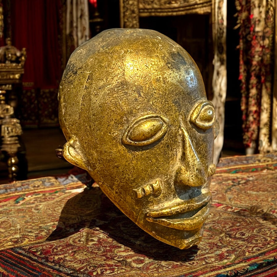 Antica maschera antropomorfa in bronzo, cultura Baule Costa d’Avorio