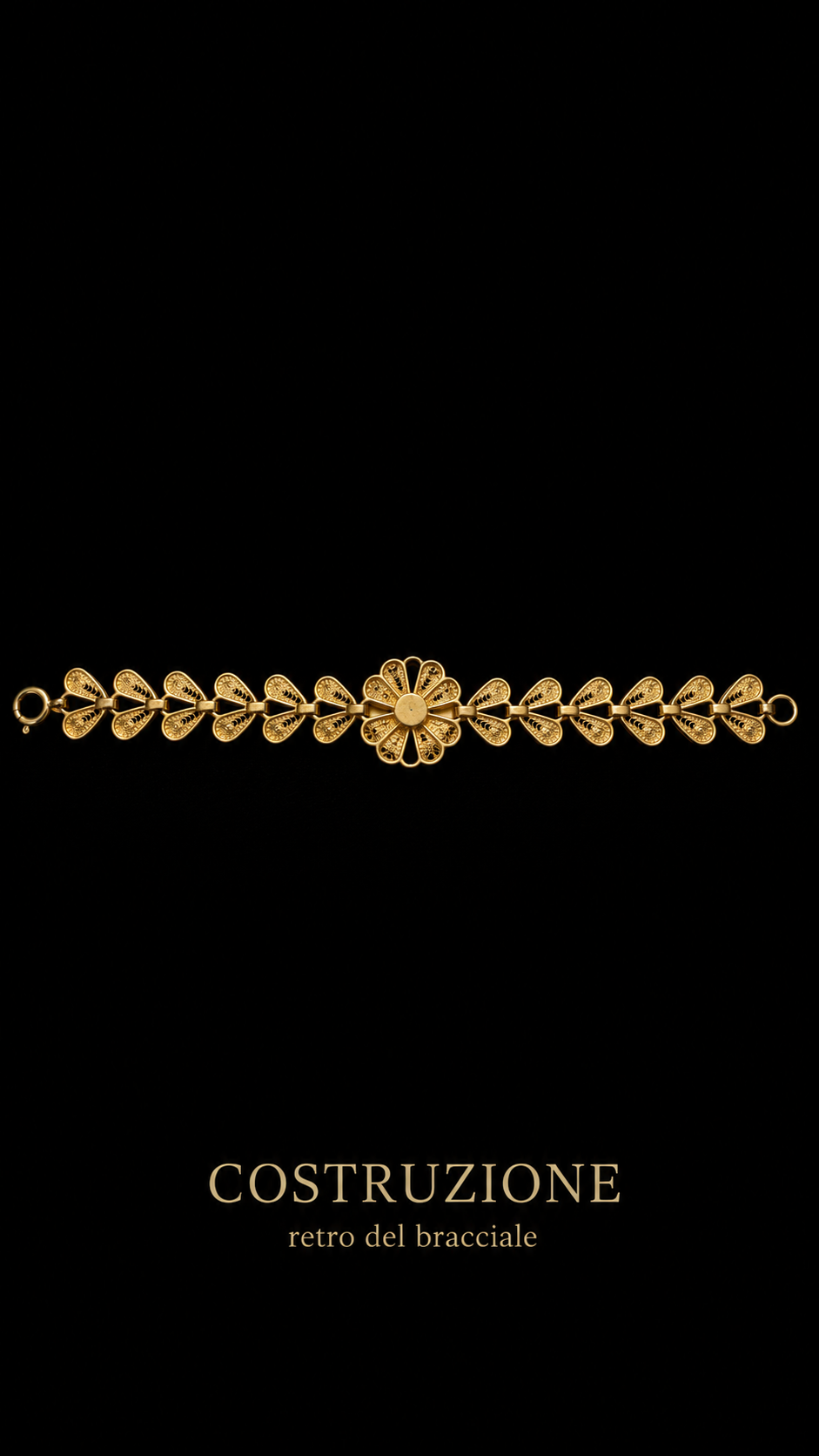 Bracciale in filigrana placcata oro testata, costruzione a ghirlanda con bell’elemento floreale centrale, anni ‘60 ca