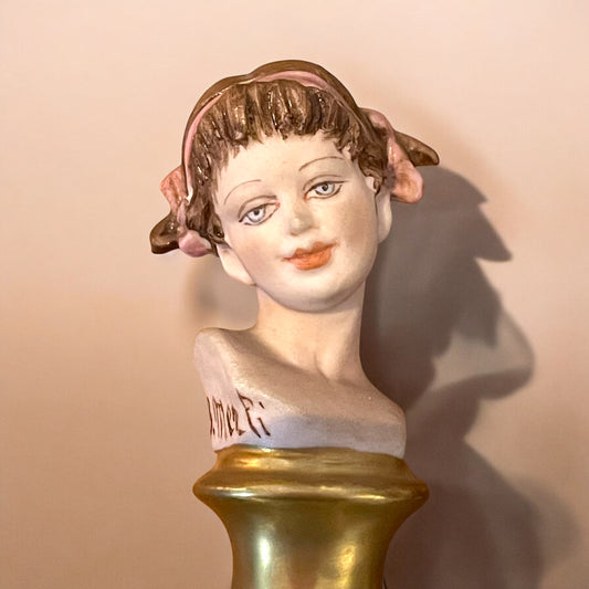 Coppia busti testine Merli Capodimonte