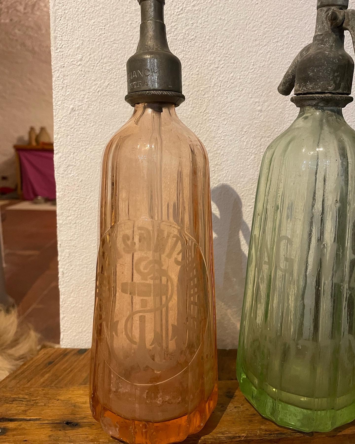 Pink and green seltzer