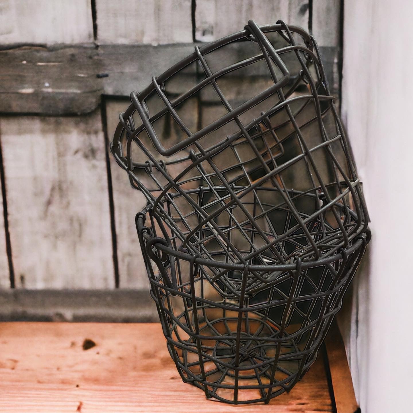 Pair of iron egg baskets