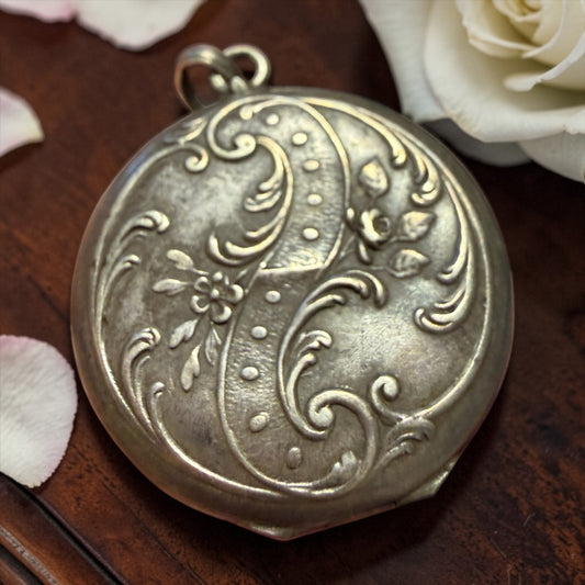 Gioiello pendente locket in argento francese, bifacciale, Art Nouveau con due fotografie d’epoca