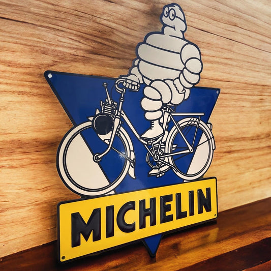 Bibendum teaches on a bicycle