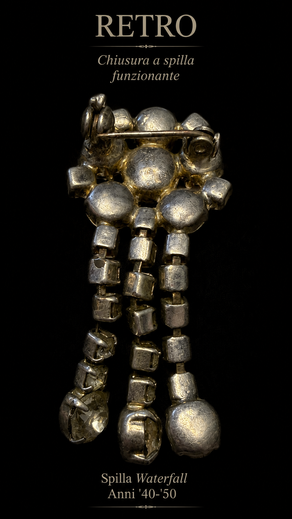 Waterfall brooch anni 40-50 con catenelle di strass in vetro e castone verde centrale