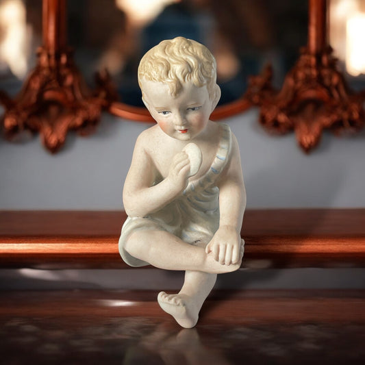 Statuina piano baby in bisquit con galletta