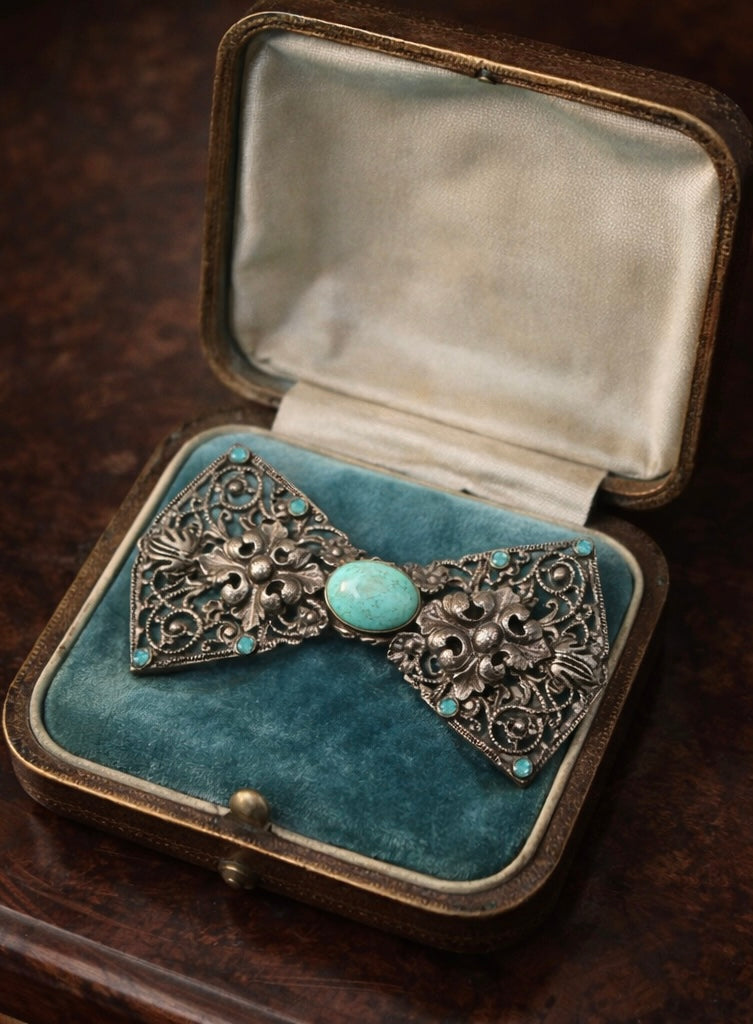 Spilla art déco a papillon anni ‘30 in argento 800 con turchese