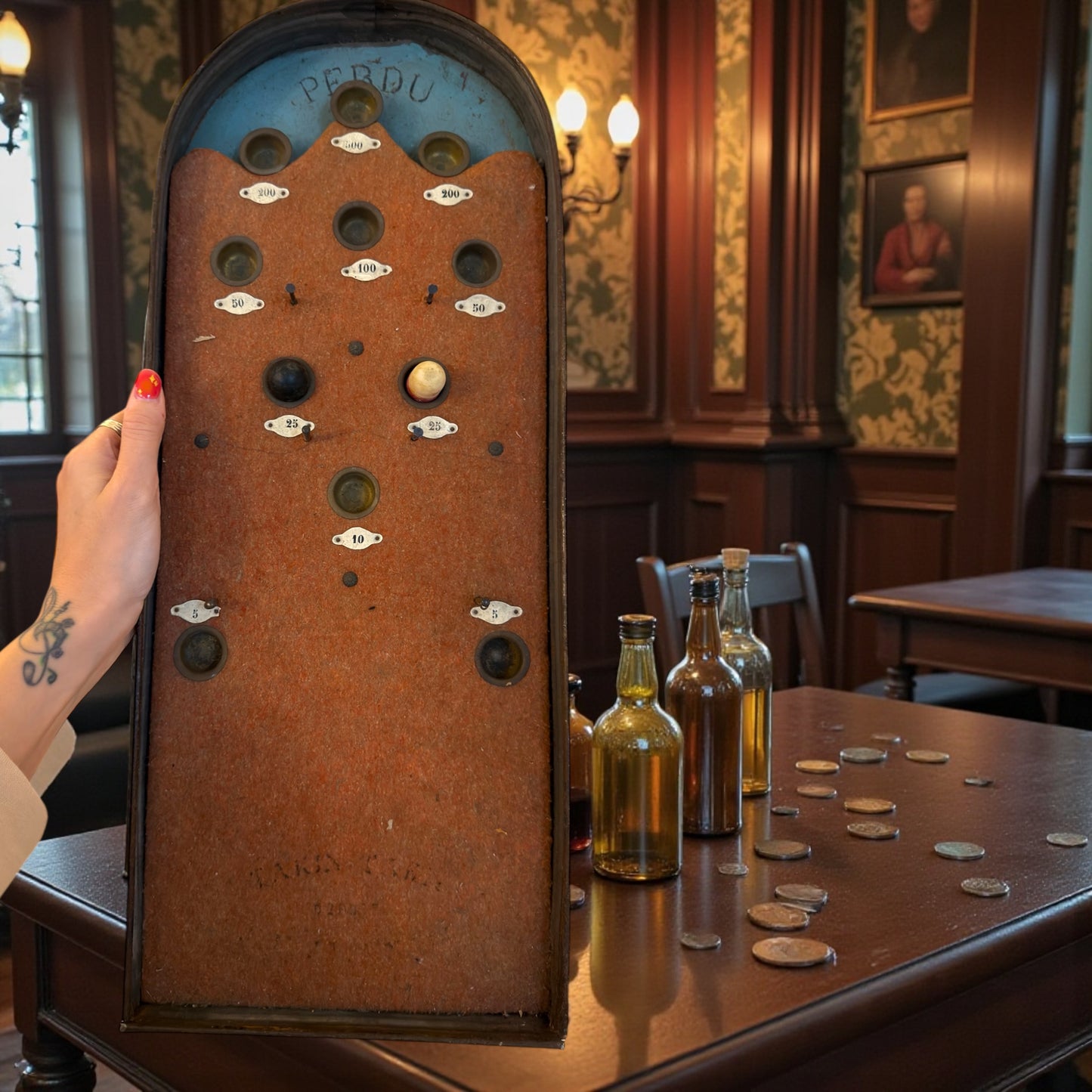 Antico jeu de bagatelle variante Culbuto con sfera e “pallina pesata” ovale