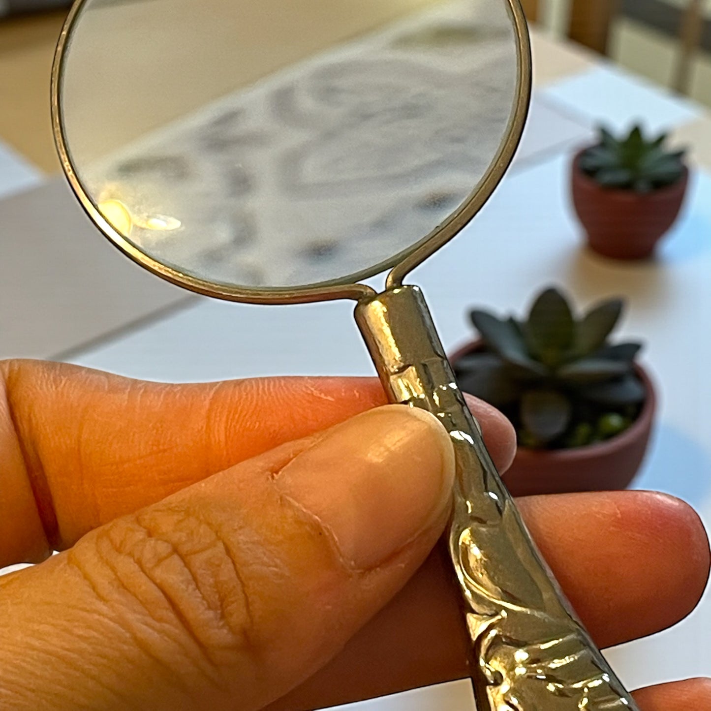 Coppia di lenti da scrittoio, rame argentato e vetro, ca anni ‘50