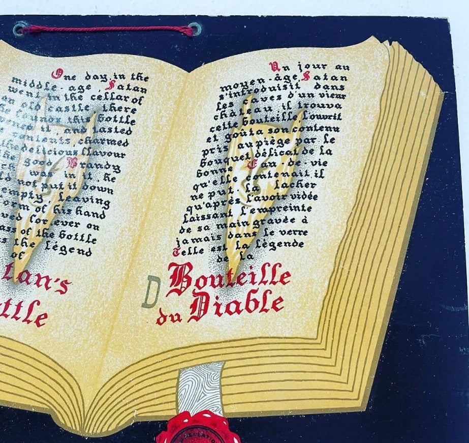 Insegna cartonata pubblicitaria anni ‘40 “Cognac del Diavolo” o Bouteille du Diable