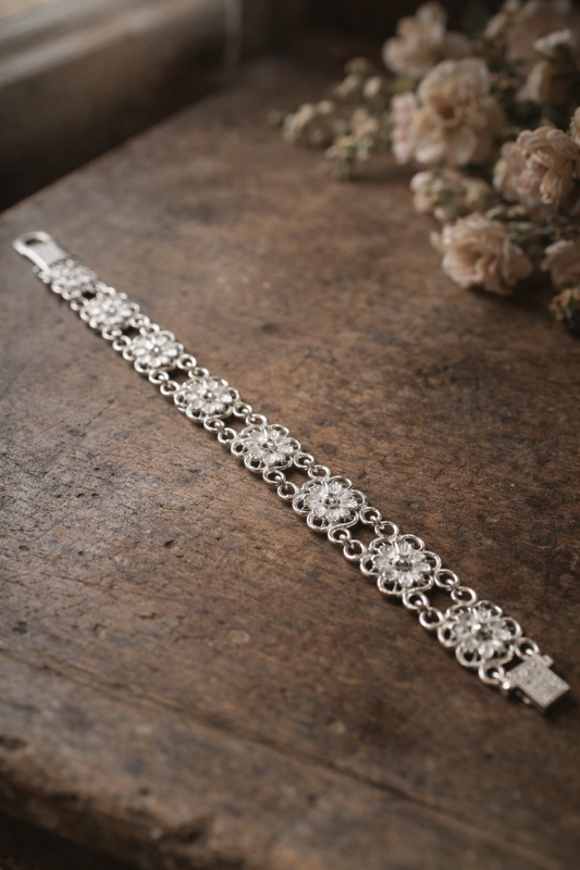 Bracciale anni ‘60 filigrana in argento 800 ad elementi floreali