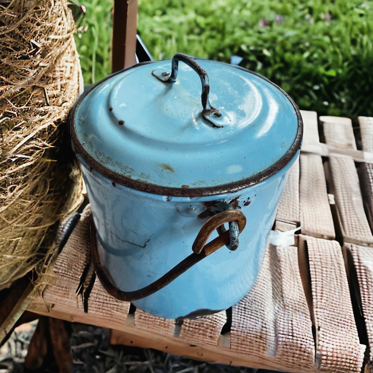 Set of three enameled saucepans and jug