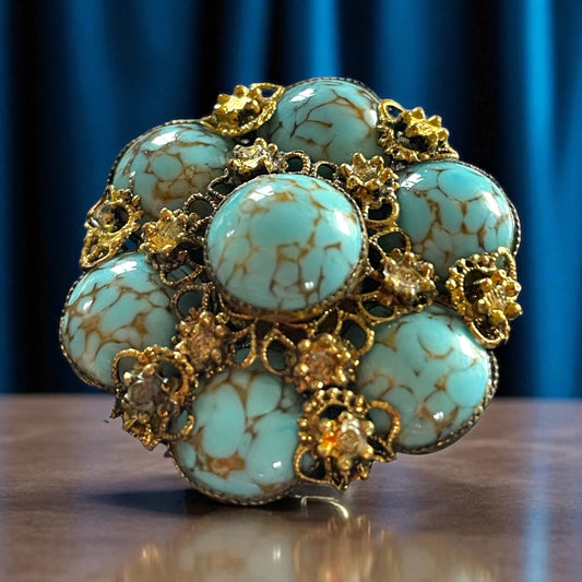 Spilla dorata anni ‘60 con vetri screziati