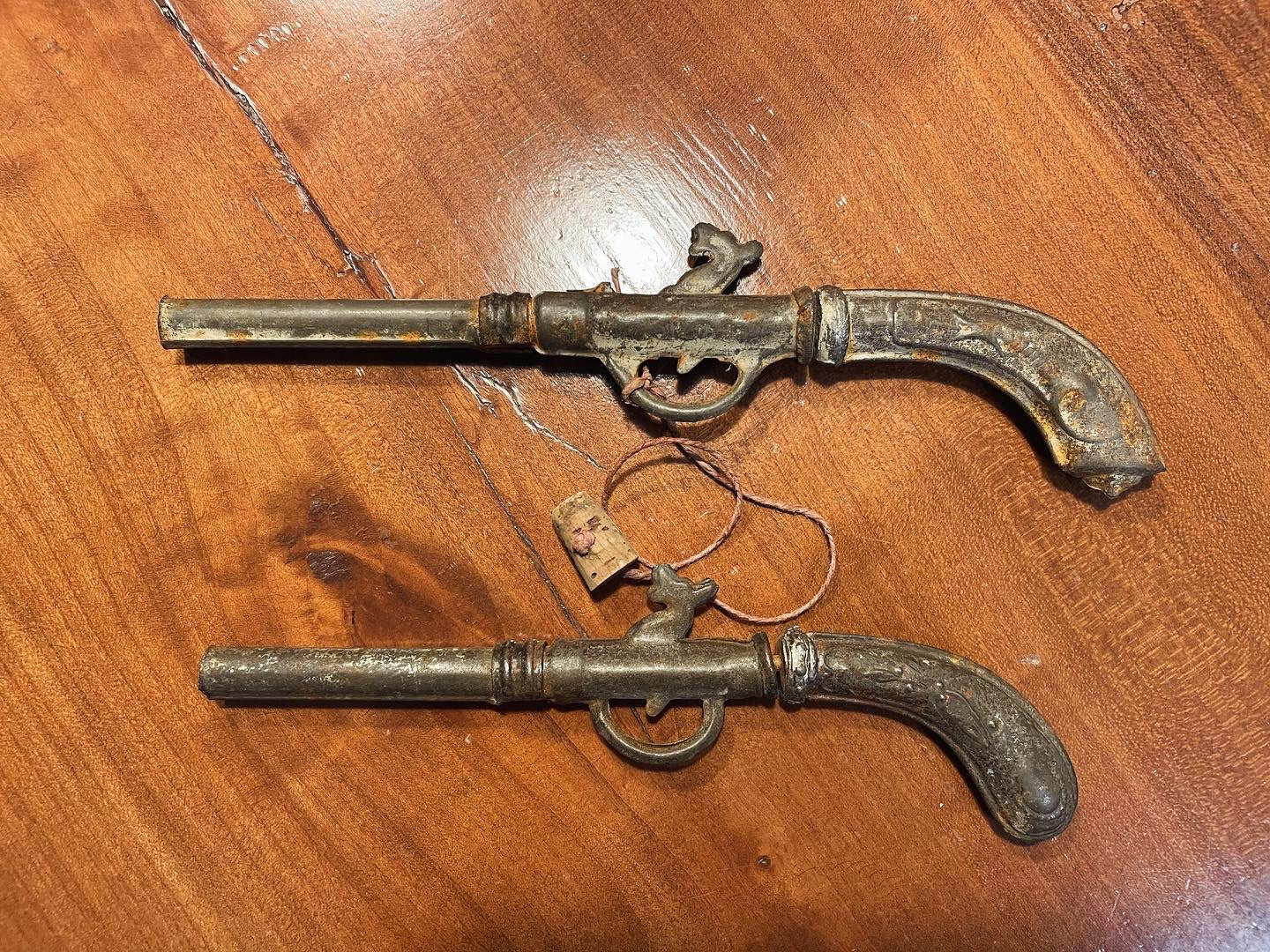 Pair of antique toy guns