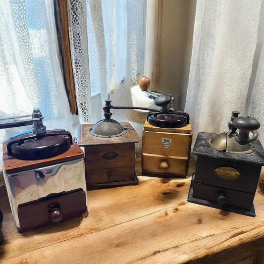 Collection of 4 antique Peugeot grinders