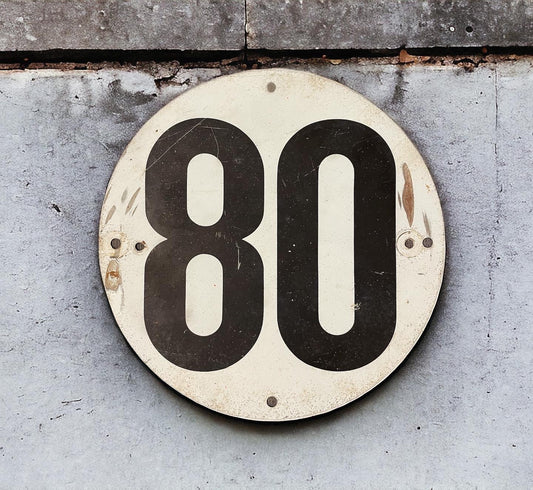 80 speed limit sign