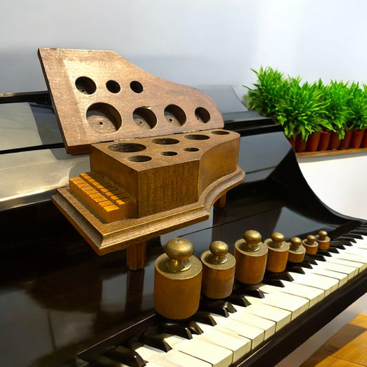 Set di pesi anni ‘40 in pesiera a pianoforte a coda
