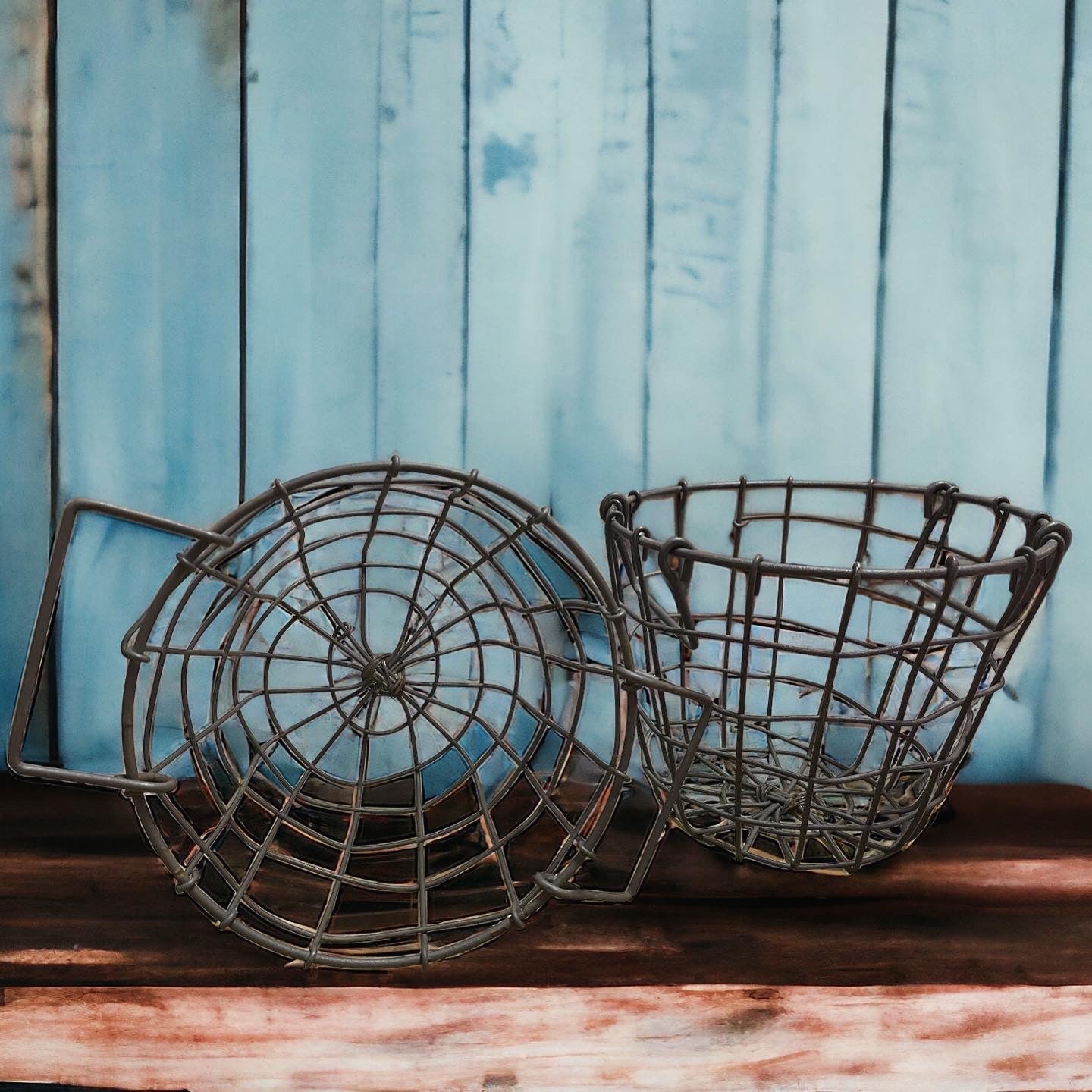 Pair of iron egg baskets