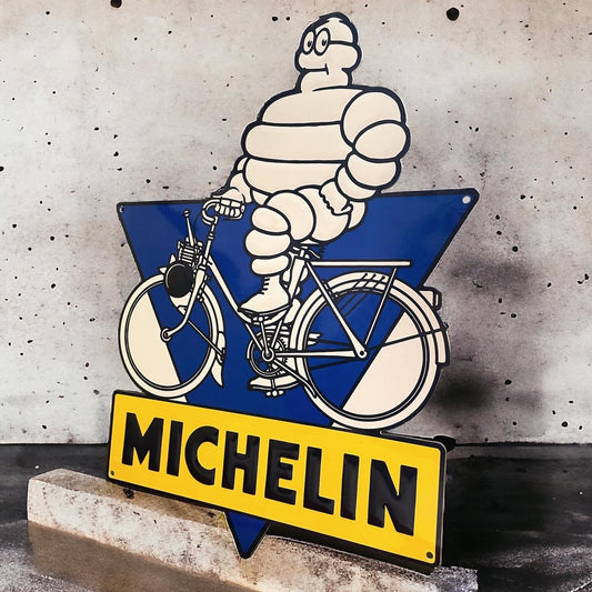 Insegna Bibendum in bicicletta