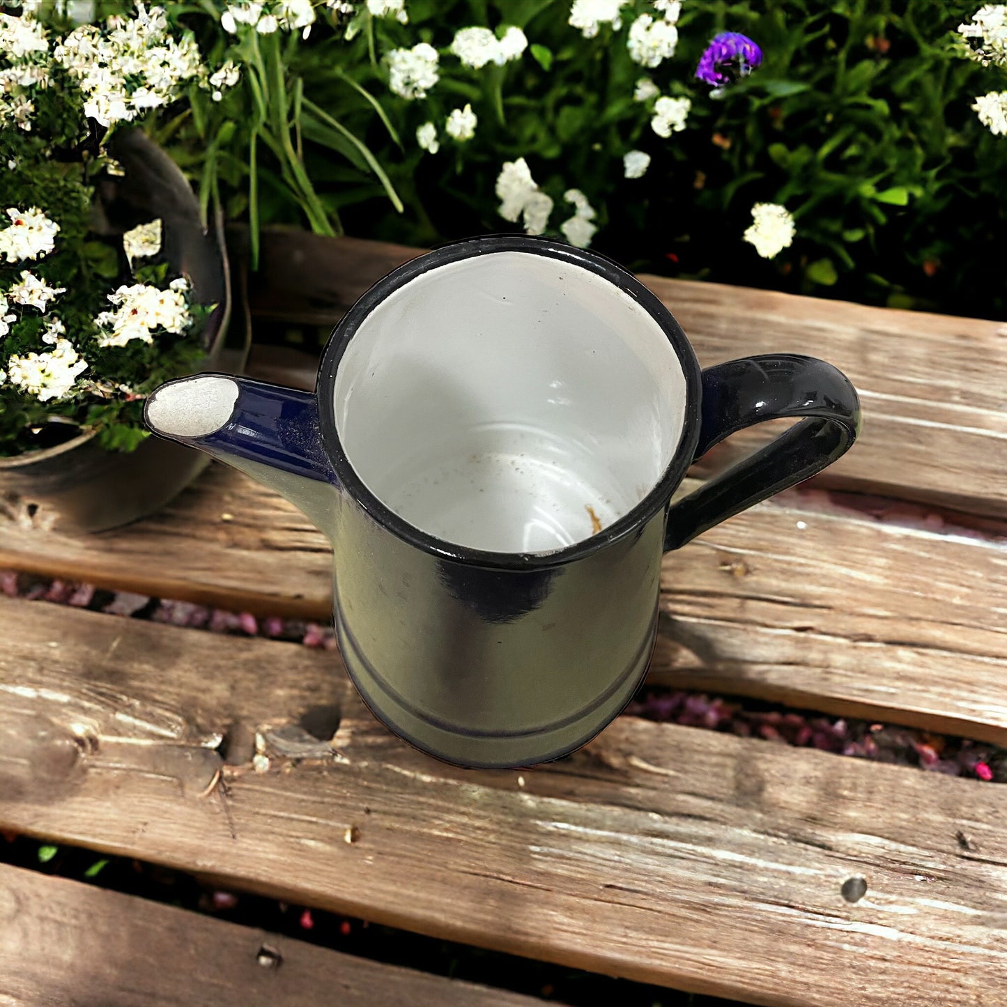 Antique blue enamel jug