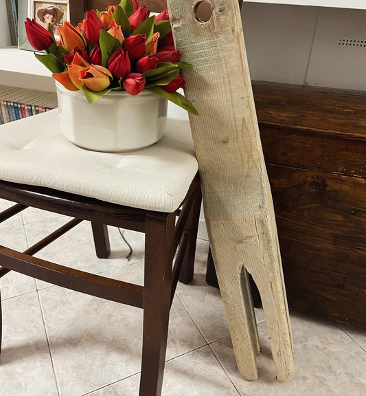 Antico agitatore per panni da lavatoio pubblico