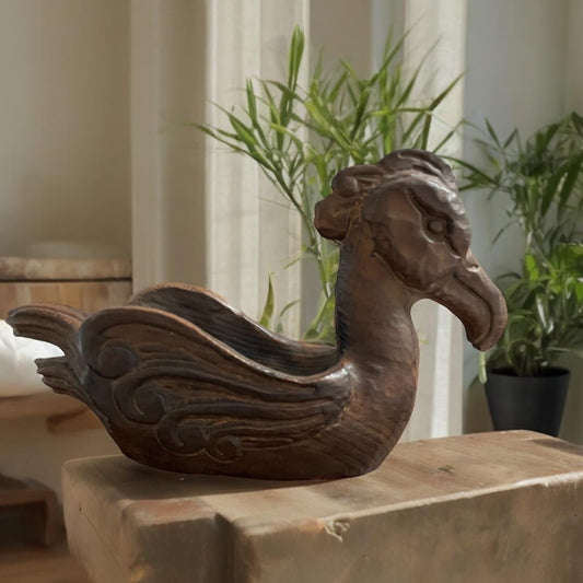 Wooden sculpture of a water bird