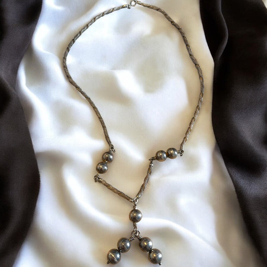 Collana lunga in argento 800 con sfere, argentiere italiano Treviso, ca anni 50 - 70