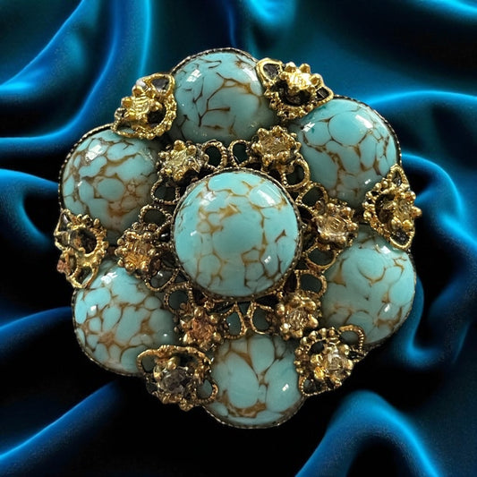 Spilla dorata anni ‘60 con vetri screziati