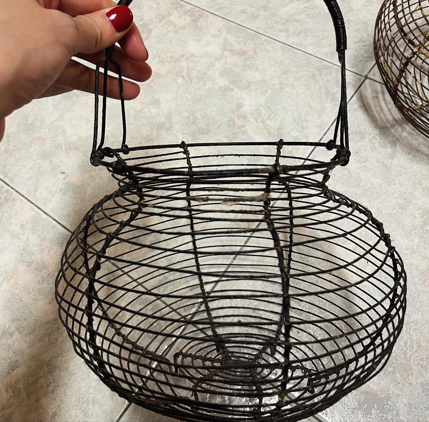 Tris of antique egg baskets