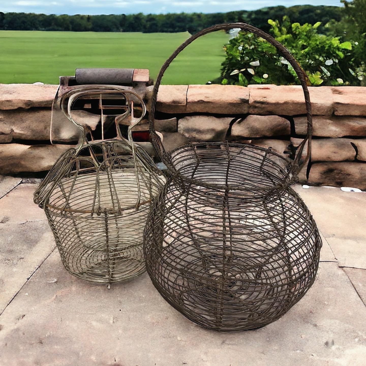 Pair of antique egg baskets