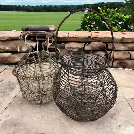 Pair of antique egg baskets