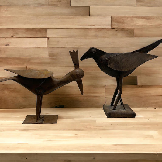 Burnished iron bird sculptures