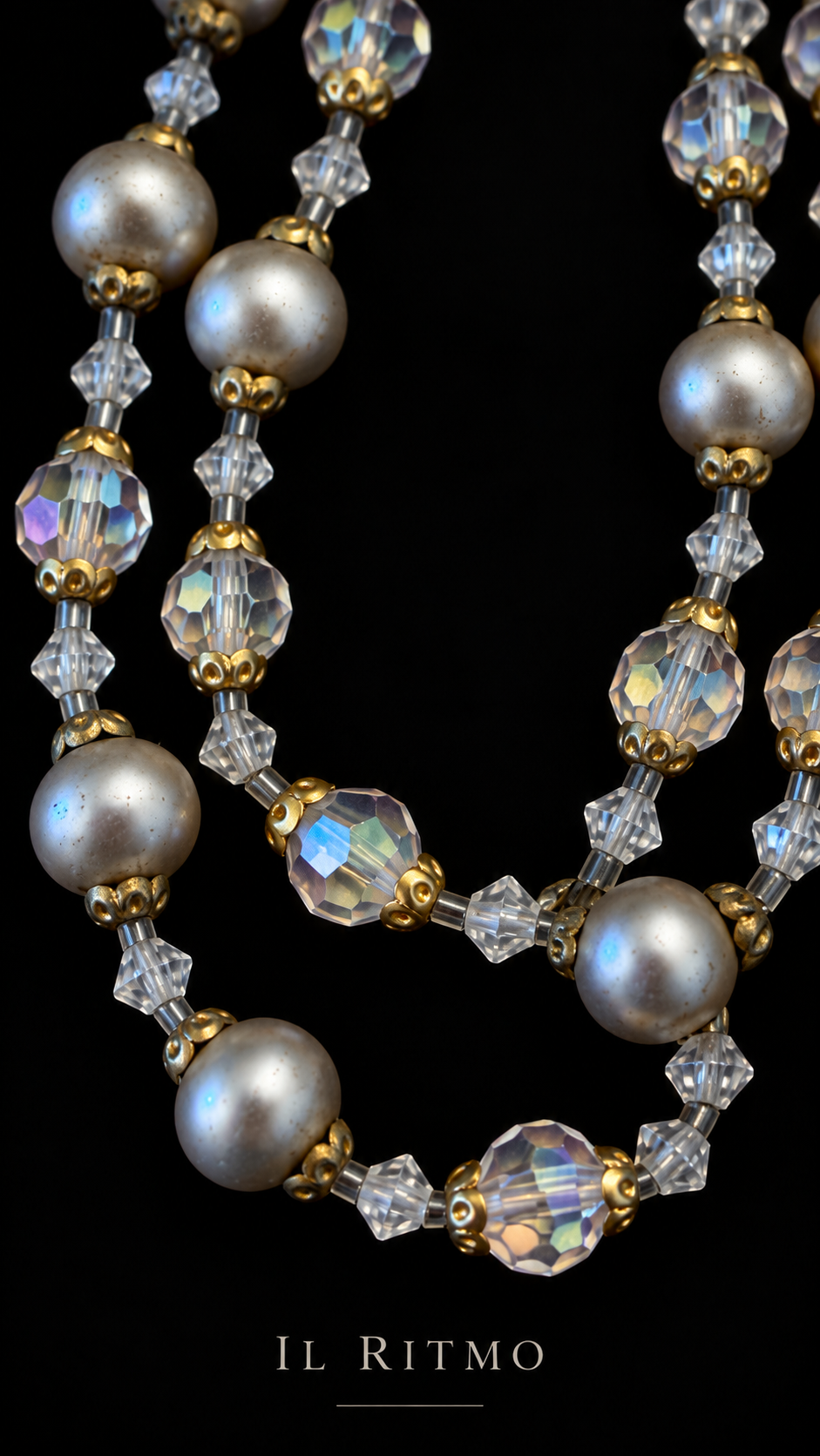 Collana gioiello a due fili con alternanza di perle e elementi in vetro sfaccettato Aurora Borealis