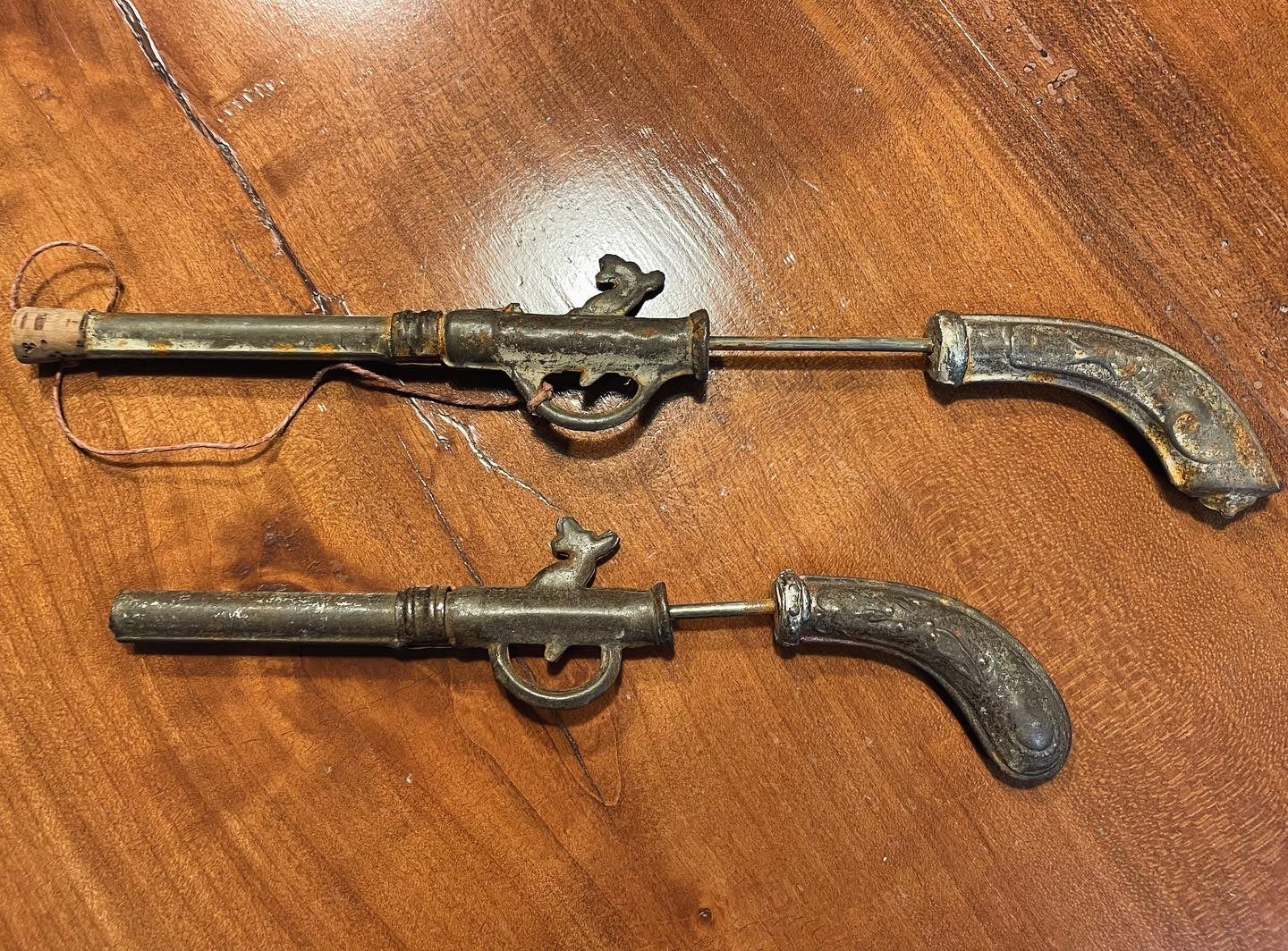 Pair of antique toy guns