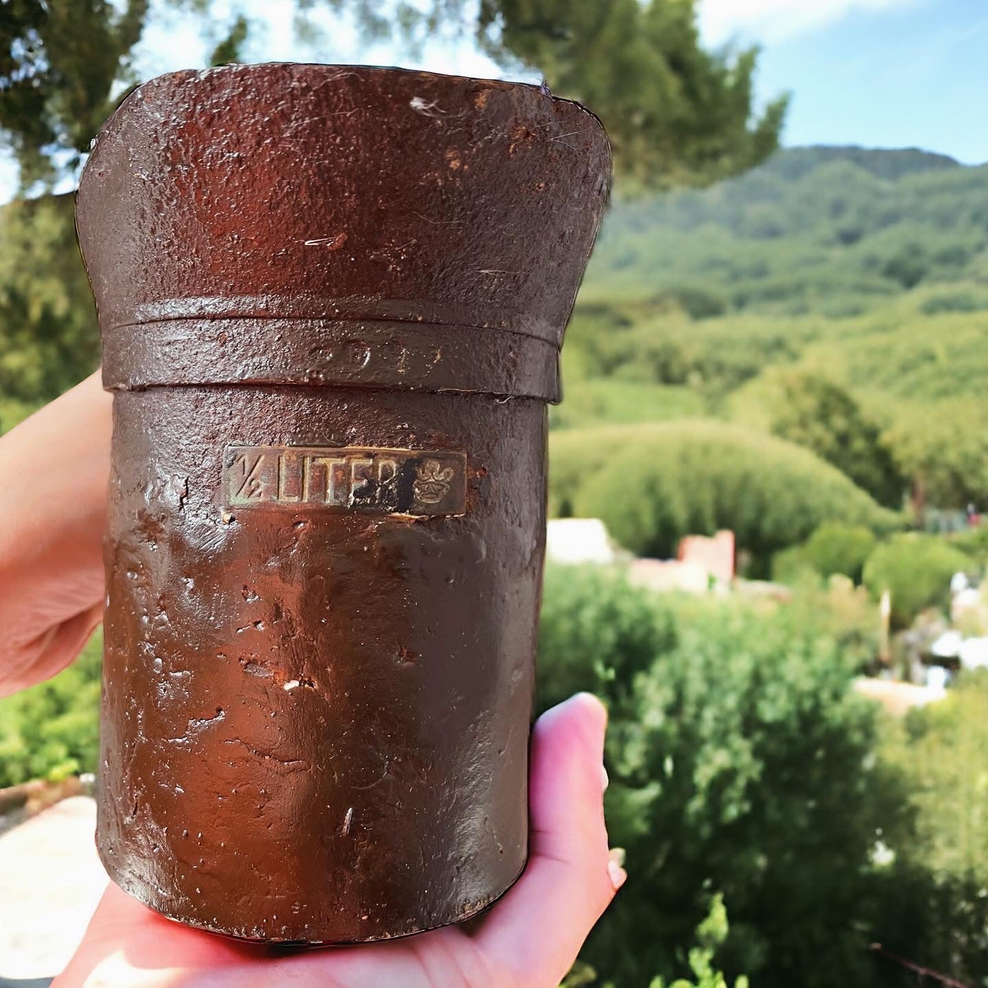 Oil bottle and half-liter measure