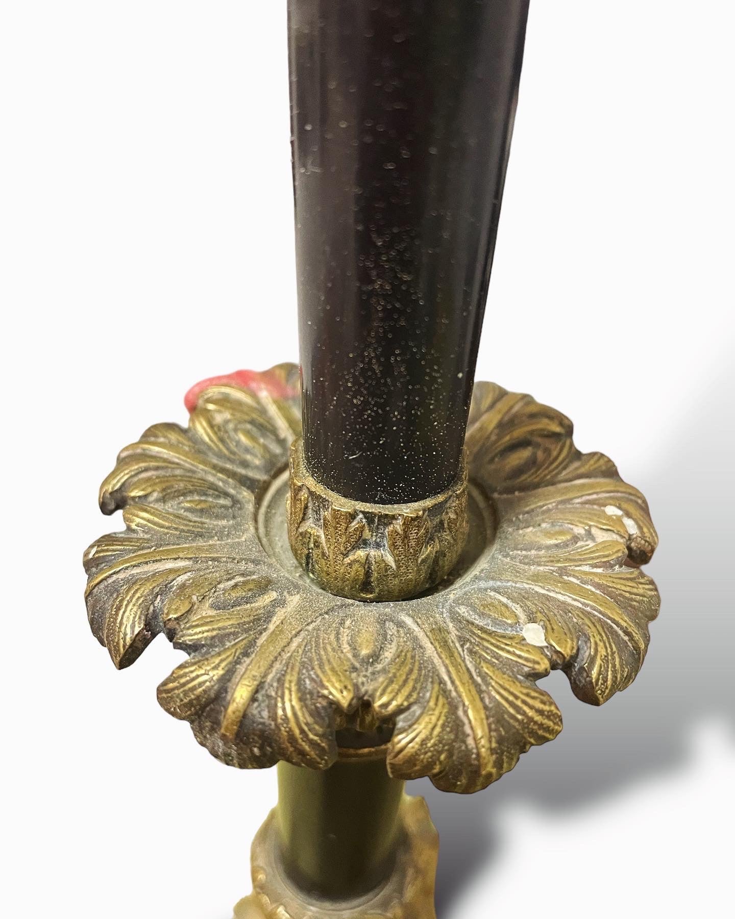 Sacred candlestick with hoofed feet