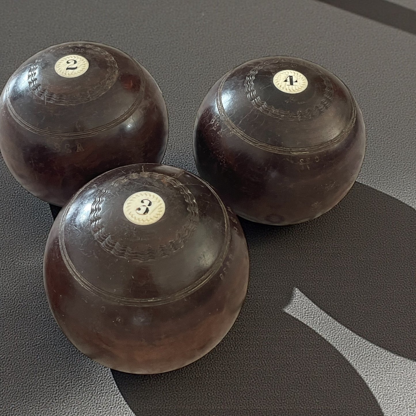 Set bocce agonistiche scozzesi con jack, casa Thomas Taylor, anni ‘20-‘30