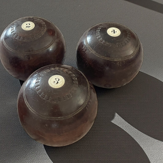 Set bocce agonistiche scozzesi con jack, casa Thomas Taylor, anni ‘20-‘30