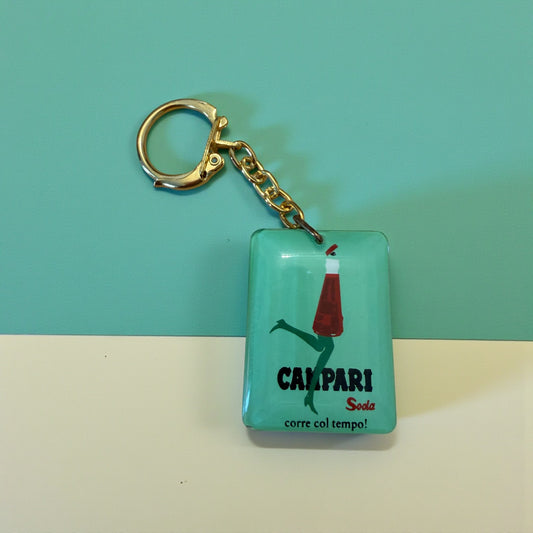 Portachiavi futurista Campari “Corre col tempo” vintage 70s