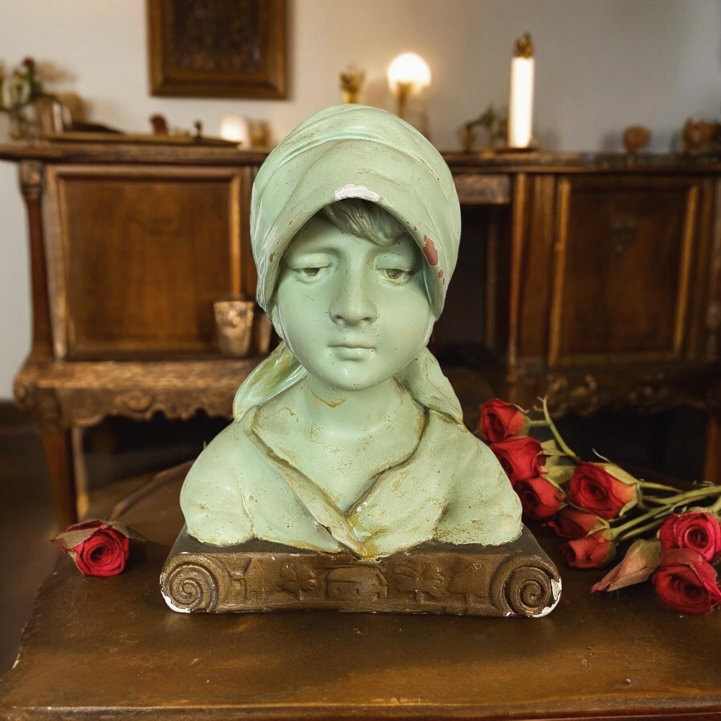 Art Deco bust of a young girl in the village