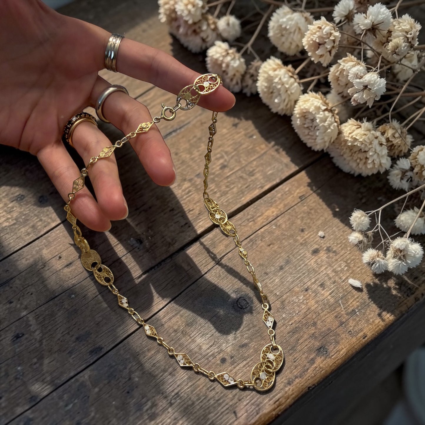 Collana in filigrana di argento e bagno dorato, anni ‘60 ca italiana nuova
