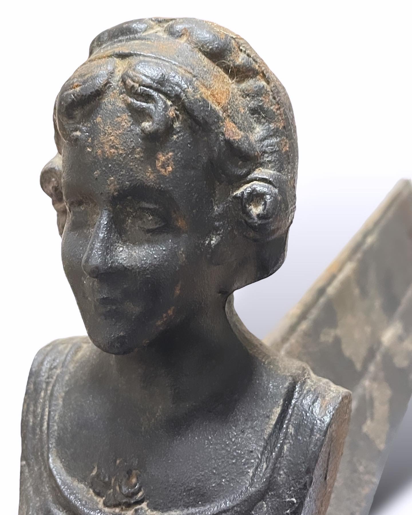 Ancient andirons bust of a woman