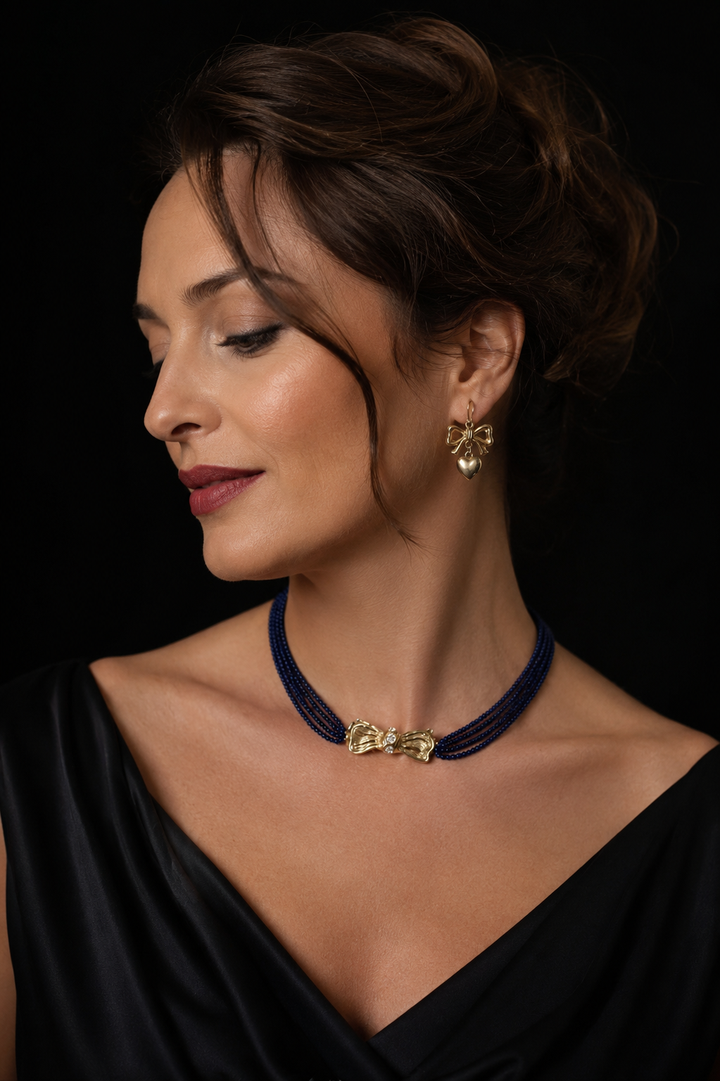Parure BLU NOTTE americana anni ‘50 collana con fiocco in bagno oro e orecchini coordinati