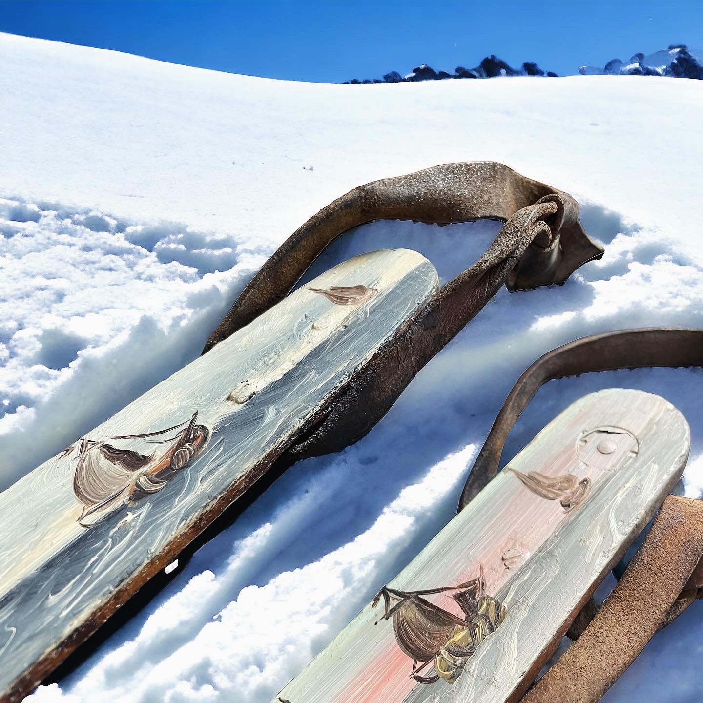 Skis ice skates painted antique