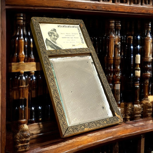 Specchio pubblicitario, anni 20, produzione vinicola in Cornice intarsiata