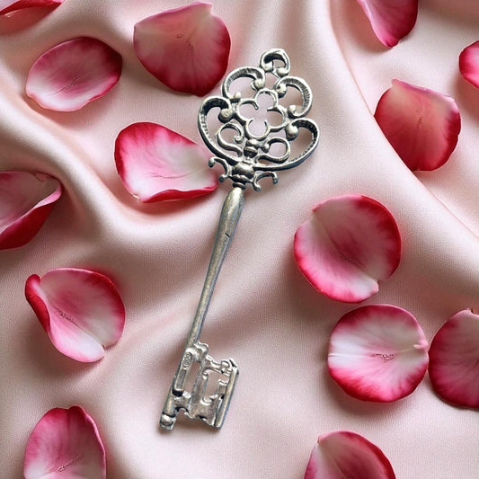 Pendente a guisa di chiave in argento 800, ca metà ‘900